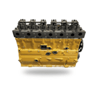 Yellow industrial engine block with visible cylinder head springs, isolated on white background.